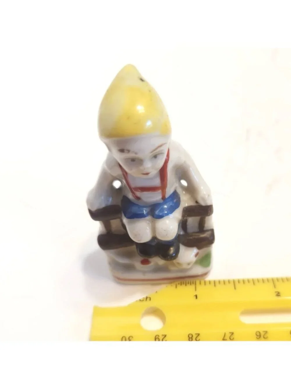 Vintage Mini Hand-Painted Porcelain Figurine Of A Boy Sitting On A Bench READ